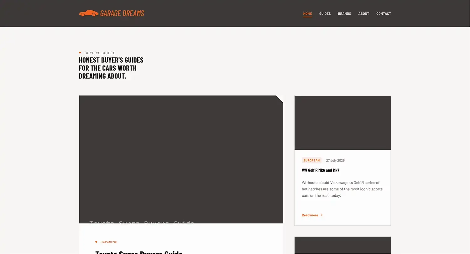 The rebuilt Garage Dreams homepage, showing the orange and charcoal identity above a grid of car buyer's guides